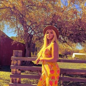 Yellow floral summer romper.